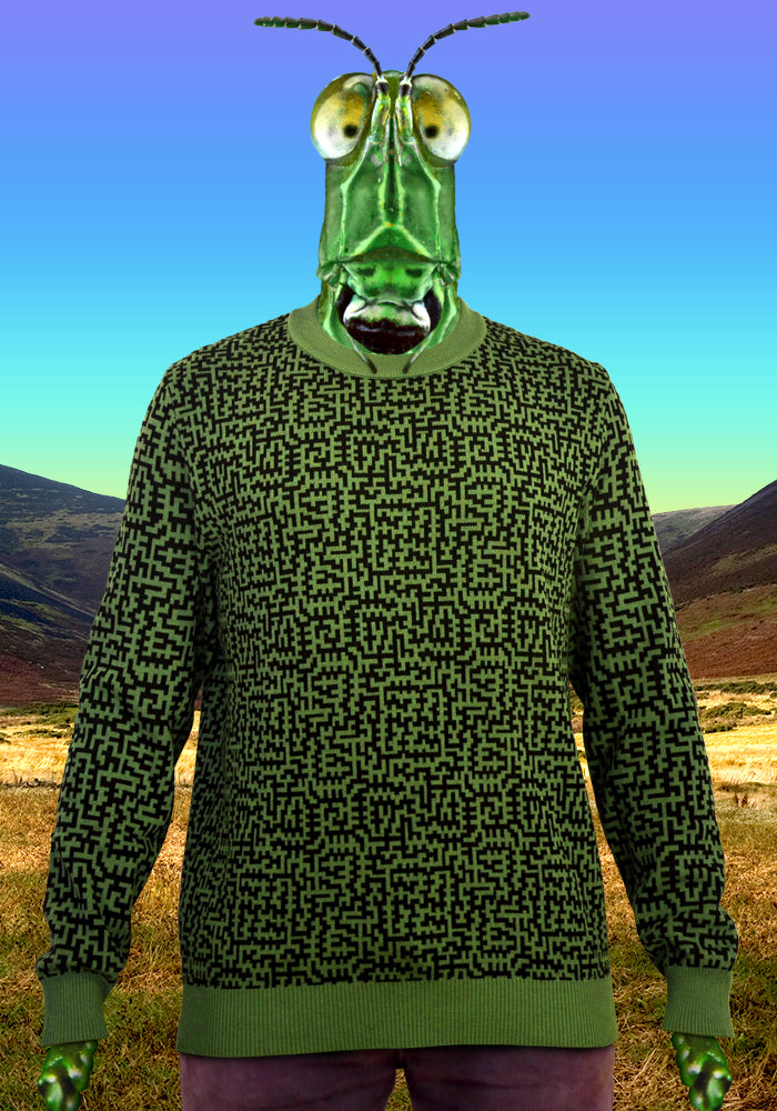 Green and black knitted cotton sweatshirt with glitchy geometric patterns printed all over. Op Art psychedelic Maze pattern designed by underground cult fashion brand TAPT.