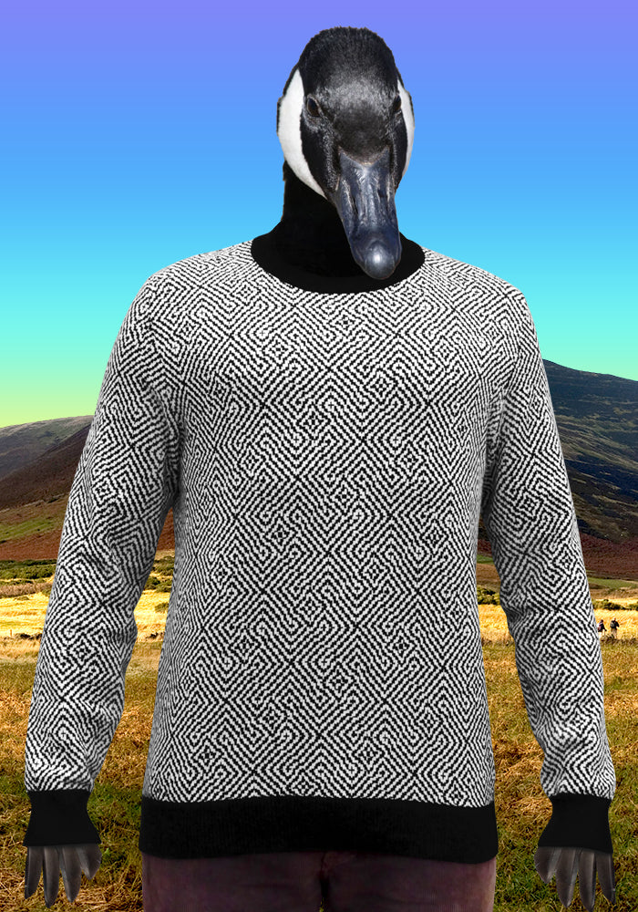 Black and White Knitted Cotton Jumper with trippy zig-zag asymmetrical tessellating geometric pattern. Psychedelic Op Art was designed by the alternative cult clothing brand TAPT.